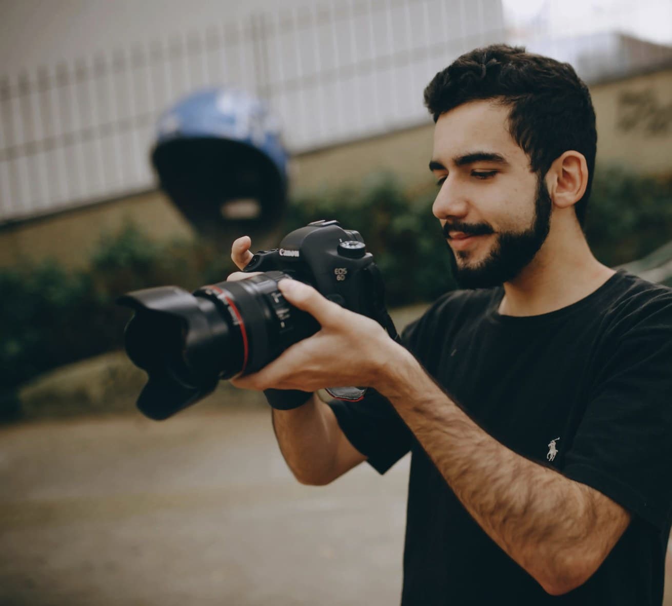 Student photographer taking photos with a Canon DSLR